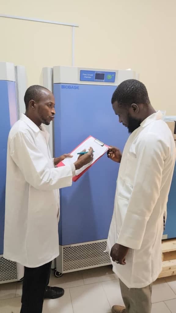 Researchers with Biobase plant growth chambers in the Climate Simulation Laboratory