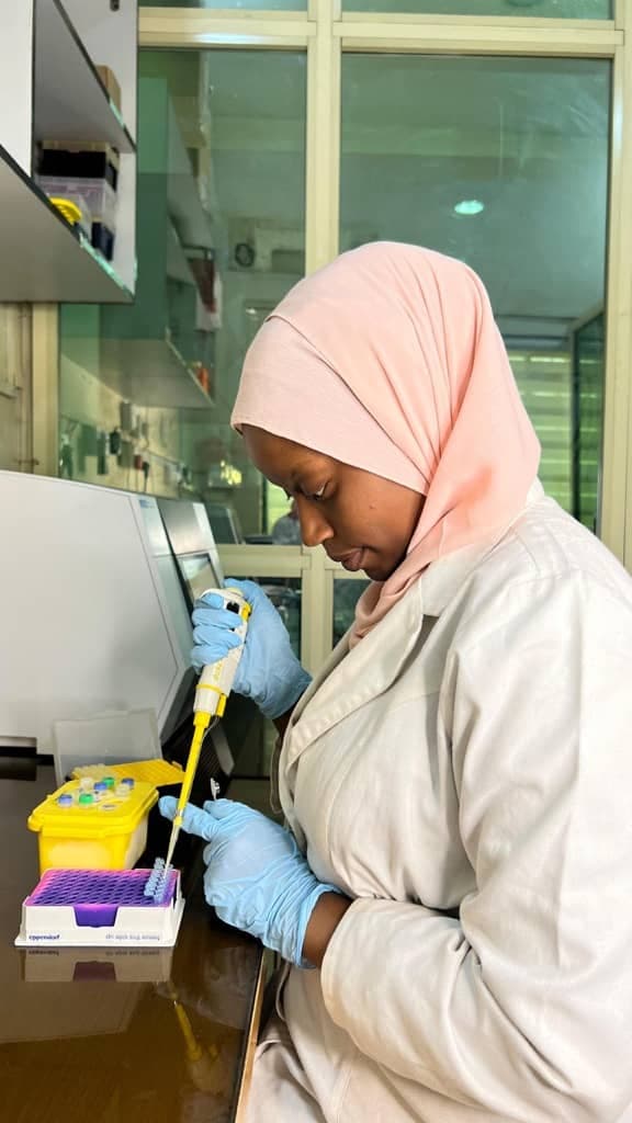 Researcher pipetting in the Molecular Biology Laboratory